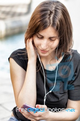 Woman Checking Her Smart Phone Stock Photo