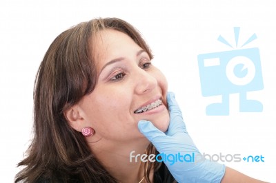 Woman Checking His Routine Brackets On Her Dentist Stock Photo