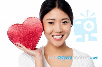 Woman Displaying Her Valentine Gift Stock Photo