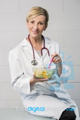 Woman Doctor Having Lunch Stock Photo