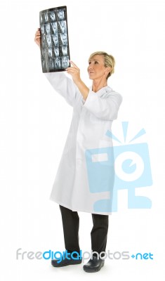 Woman Doctor Holding X.rays Stock Photo