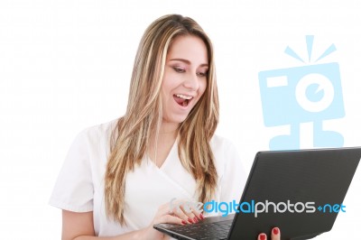 Woman Doctor Surprising With Laptop Stock Photo