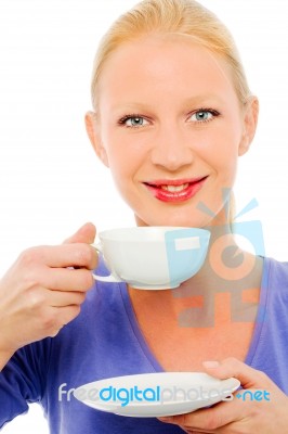 Woman Drinking A Cup Of Coffee Stock Photo