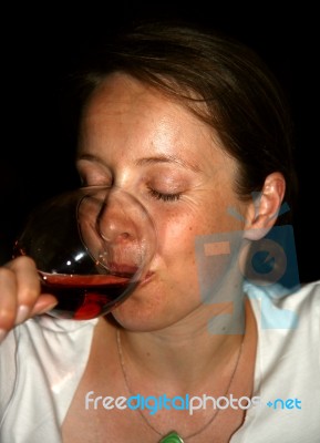 Woman Drinking Red Wine Stock Photo