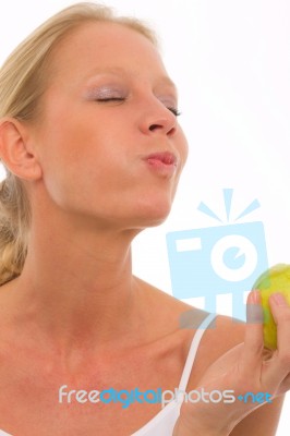 Woman Eating Apple Stock Photo