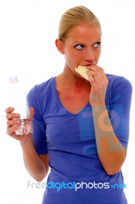 Woman Eating Sandwich Stock Photo