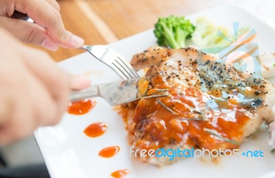 Woman Eating Steak Stock Photo