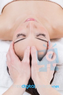 Woman Enjoying Massage At Beauty Spa Stock Photo