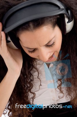 Woman Enjoying Music Stock Photo