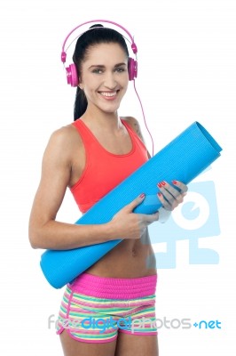 Woman Enjoying Music After Workout Stock Photo