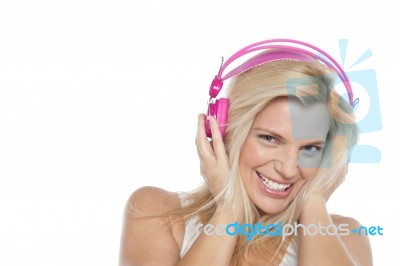 Woman Enjoying Music With Headphones On Stock Photo