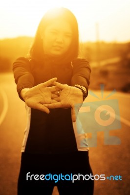 Woman Exercising Outdoor At Sunset  Stock Photo