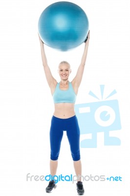 Woman Exercising With Gymnastic Ball Stock Photo