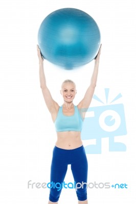 Woman Exercising With Gymnastic Ball Stock Photo