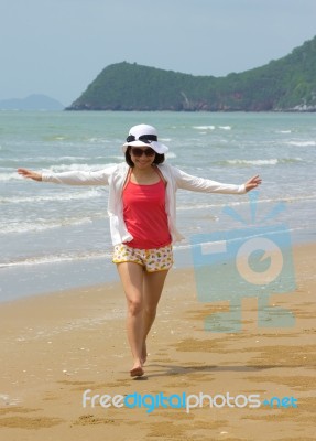 Woman Full Length With Relaxing On The Beach Stock Photo