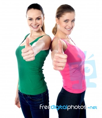 Woman Gesturing Thumbs Up Stock Photo