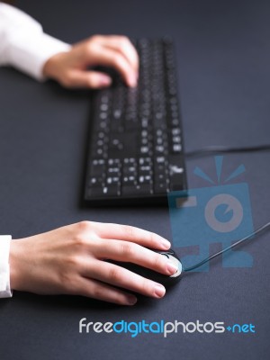 Woman Hand Typing On Keyboard Stock Photo