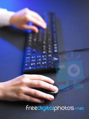 Woman Hand Typing On Keyboard Stock Photo