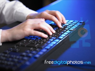 Woman Hand Typing On Keyboard Stock Photo