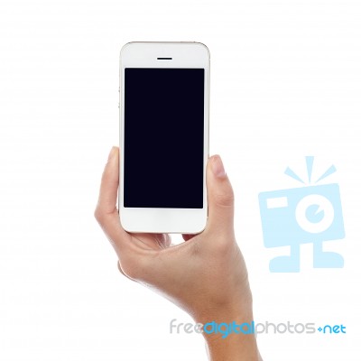 Woman Hand With A New Mobile Handset Stock Photo