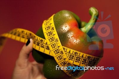 Woman Hand With Bell Pepper Stock Photo