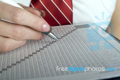 Woman Hand With Pen And Paper Stock Photo