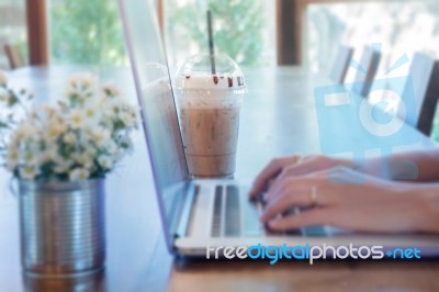 Woman Hands Typing On Laptop Stock Photo