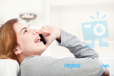 Woman Have Joyful Talk Over Phone Stock Photo