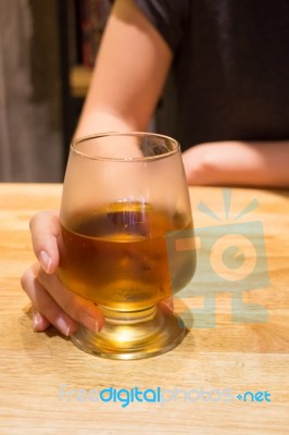 Woman Having Alcoholic Drink In The Bar Stock Photo