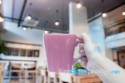 Woman Holding Coffee Cup With Abstract Blur Coffee Shop Stock Photo