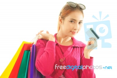 Woman Holding Credit Card And Shopping Bags Stock Photo