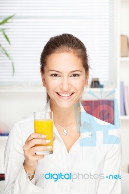 Woman Holding Glass Of Orange Juice Stock Photo