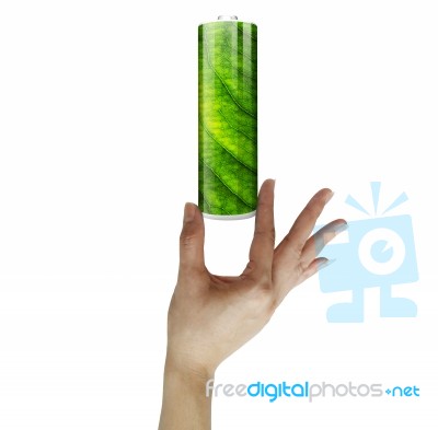 Woman Holding Green Battery Stock Photo