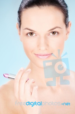 Woman Holding Lipstick Stock Photo