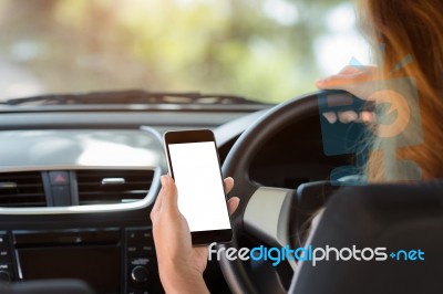 Woman Holding Phone In Car Clipping Path White Screen Stock Photo