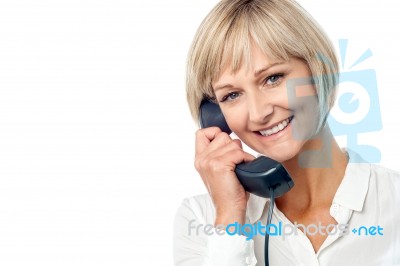 Woman Holding Phone Receiver Stock Photo