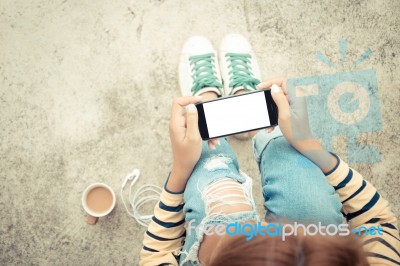 Woman Holding Phone White Screen On Top View Vintage Style Stock Photo