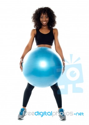 Woman Holding Pilate Ball Stock Photo