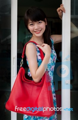 Woman Holding  Red Bag Stock Photo