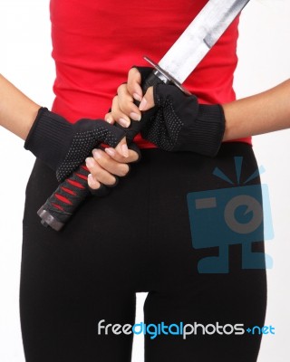 Woman Holding Samurai Stock Photo