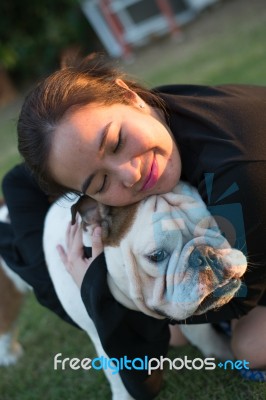 Woman Hug English Bulldog Stock Photo