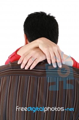 Woman Hugging Her Husband With Love Stock Photo