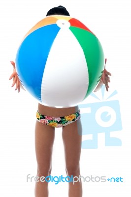 Woman In Beachwear Playing With Beach Ball Stock Photo