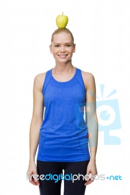 Woman In Fitness Clothing Stock Photo