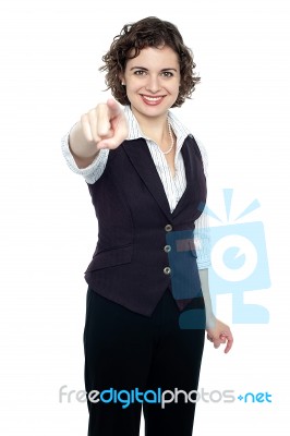 Woman In Formals Pointing Forward Stock Photo