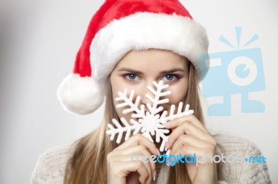 Woman In Santa Hat Stock Photo