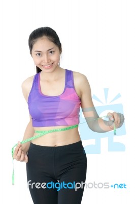 Woman In Sport Bra Measuring Her Body With Tape Isolated On Whit… Stock Photo