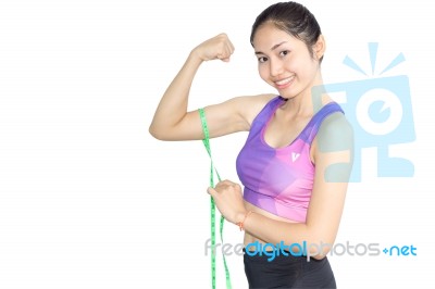 Woman In Sport Bra Measuring Her Body With Tape Isolated On Whit… Stock Photo