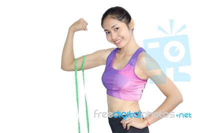 Woman In Sport Bra Measuring Her Body With Tape Isolated On Whit… Stock Photo