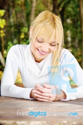 Woman In The Park With Earphones Stock Photo